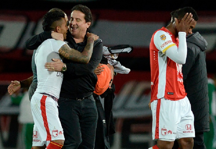 BOGOTA, COLOMBIA - SEPTEMBER 29:  Cesar Pastrana President of Independiente Santa Fe and Wilson Morelo of Independiente Santa Fe celebrate qualifying to the next round after winning a second leg match between Santa Fe and Emelec as part of round of 16 of Copa Sudamericana 2015 at Nemesio Camacho El Campin Stadium on September 29, 2015 in Bogota, Colombia. (Photo by Gabriel Aponte/Vizzor/LatinContent/Getty Images)